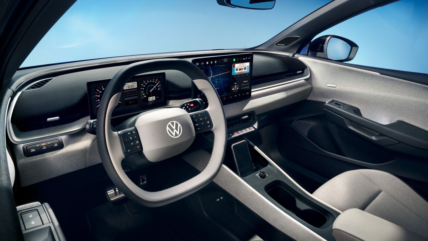 Поглед през отворената шофьорска врата към кокпита на VW ID. Поло стил.