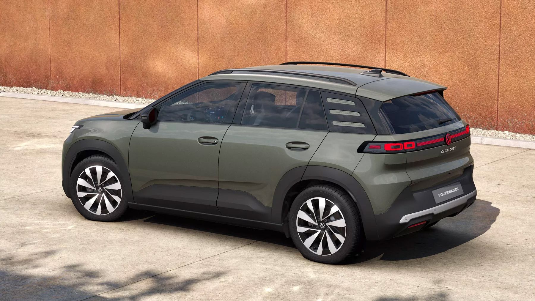 Изображението показва зелен VW ID. Cross Style в задна тричетвъртна перспектива.