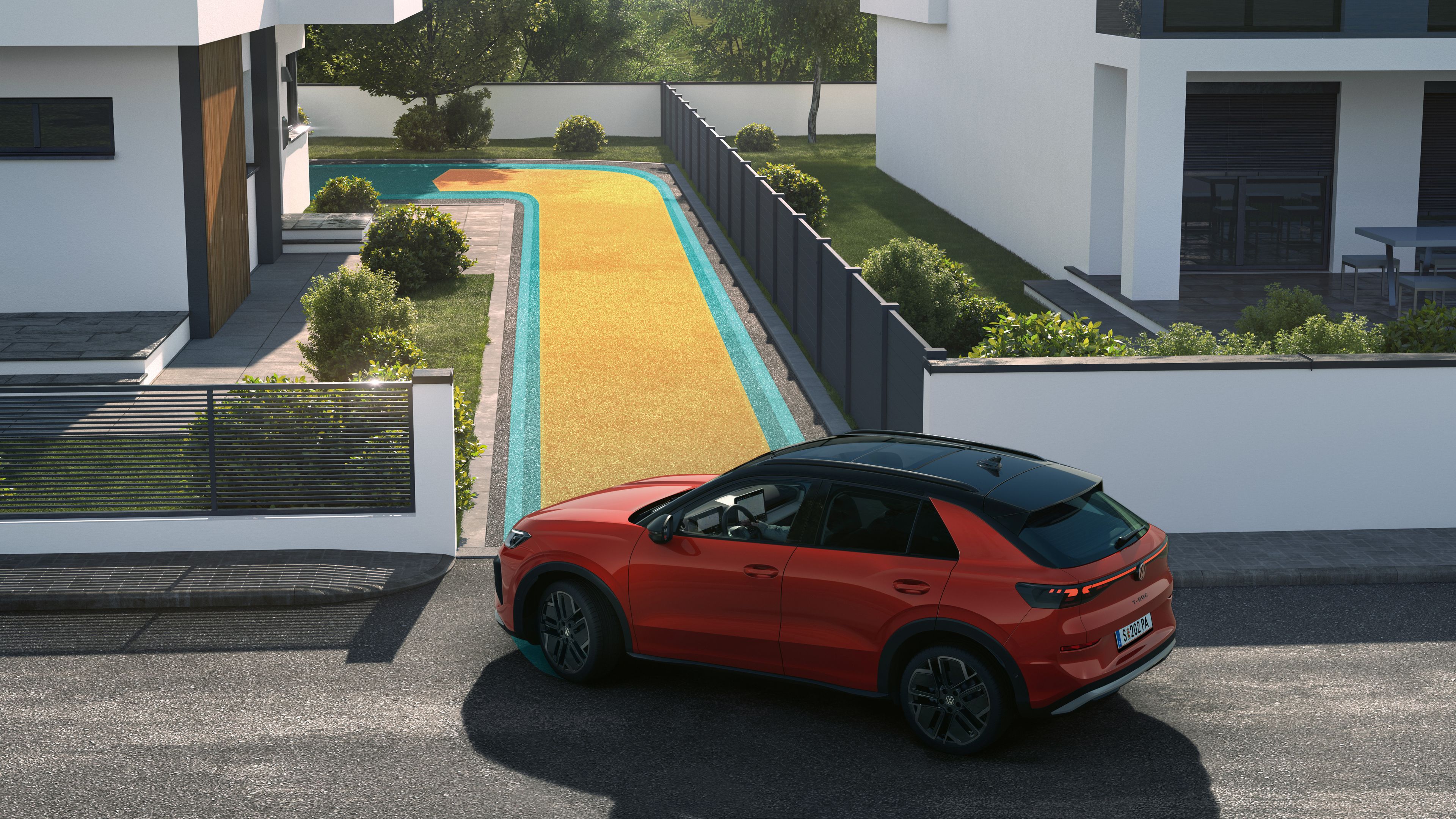 Червен Volkswagen ID.5, паркиран пред съвременна къща с двор и басейн